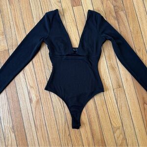 Lulu's Black V-Neck Bodysuit With Cut Out